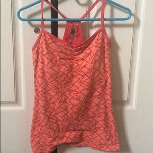 Orange athletic tank top with built in bra